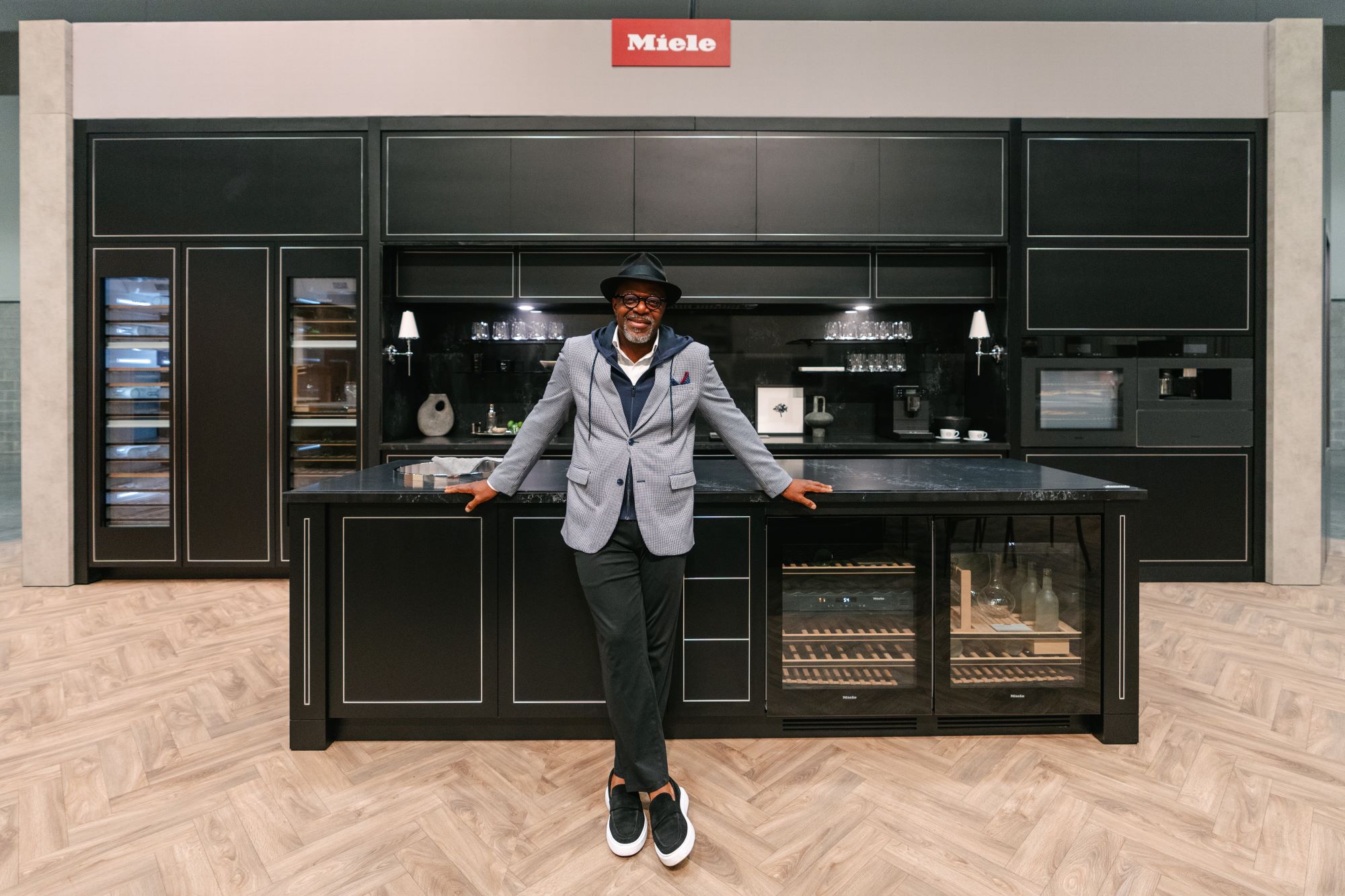 Michael London inside of Miele IDS booth